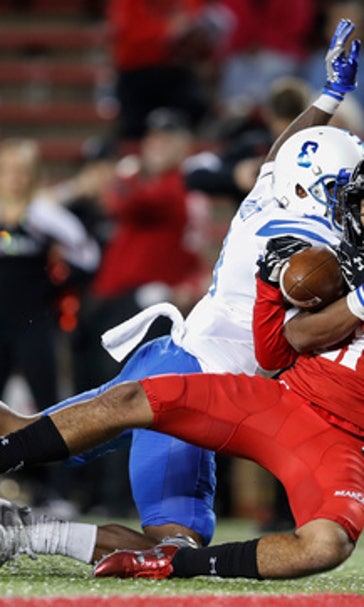 Memphis takes control early to beat Cincinnati 34-7